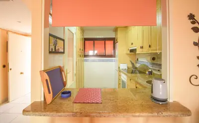 Una cocina o zona de cocina en Mediterranea 9 Vera Playa Jardines tus momentos frente al mar