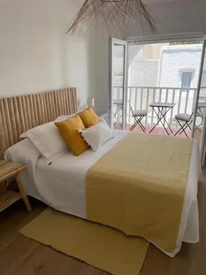 Cama o camas de una habitación en La casa del surf - Alojamiento en San José, Almería