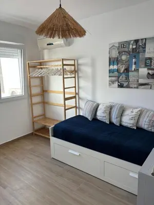 Cama o camas de una habitación en La casa del surf - Alojamiento en San José, Almería