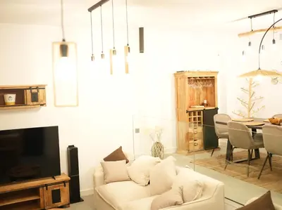 Una televisión o centro de entretenimiento en Senses Villa