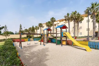 Zona de juegos infantil en Paraíso Villa Romana Residencial