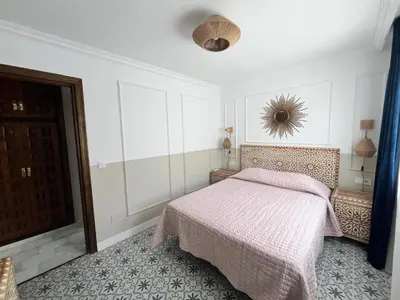 Cama o camas de una habitación en Mi Casa Vera Playa -bajo
