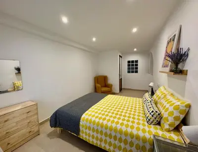 Cama o camas de una habitación en Bonito y acogedor apartamento en Tíjola