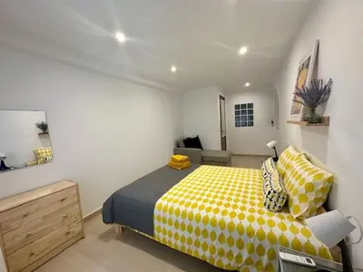 Cama o camas de una habitación en Bonito y acogedor apartamento en Tíjola
