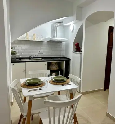 Una cocina o zona de cocina en Bonito y acogedor apartamento en Tíjola