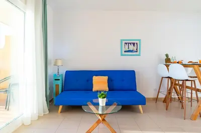 Zona de estar de Cómodo apartamento en El Calón Playa frente al mar