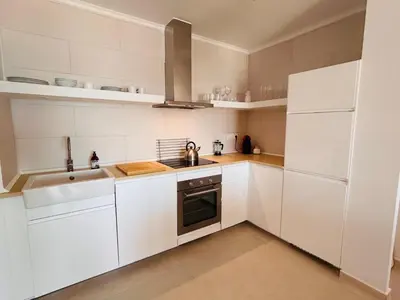 Una cocina o zona de cocina en Beachfront Nudist Apartment in Vera Playa