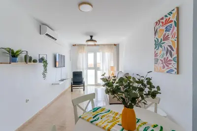 Una televisión o centro de entretenimiento en Apartamento Paquita R&R