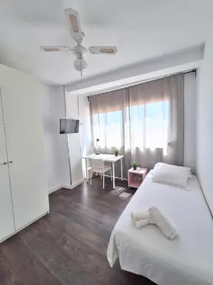 Cama o camas de una habitación en Apartamento Puerta Purchena Almeria