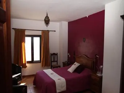 Cama o camas de una habitación en Casa Rural El Paraje de Berchules