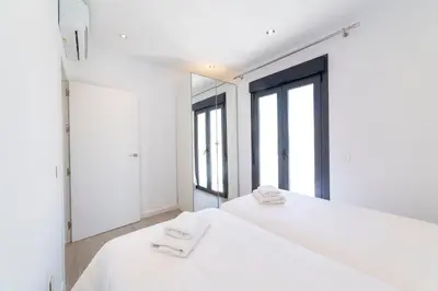 Cama o camas de una habitación en TrendyHomes Palmeral Beach Mojacar