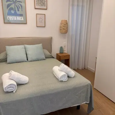 Cama o camas de una habitación en Siroco Apartamento de Lujo Los Cuatro Vientos