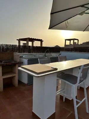 Un balcón o terraza de Ático De Diseño en Aguilas