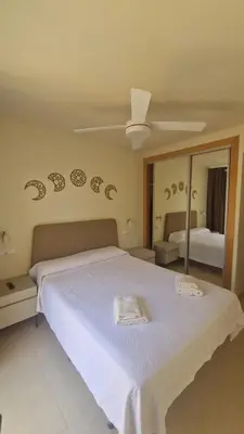 Cama o camas de una habitación en Apartamento junto al mar