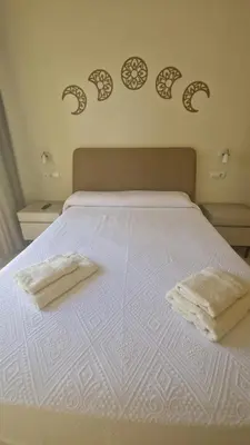 Cama o camas de una habitación en Apartamento junto al mar