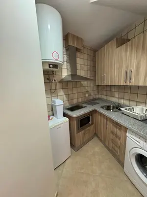 Una cocina o zona de cocina en Apartamentos Peñaflor