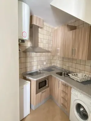 Una cocina o zona de cocina en Apartamentos Peñaflor