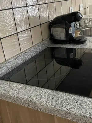 Una cocina o zona de cocina en Apartamentos Peñaflor
