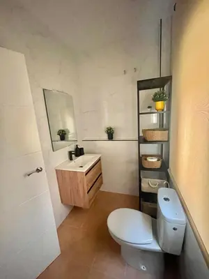 Un baño de Apartamentos El Llano Dorado 15