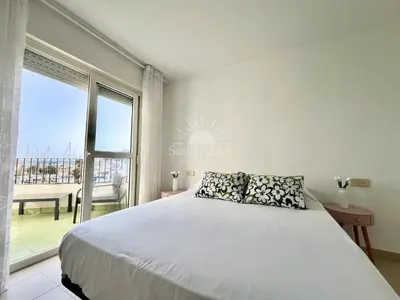 Cama o camas de una habitación en Luminoso ático en el Puerto de Almerimar