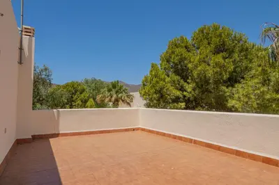 Un balcón o terraza de El Olivo