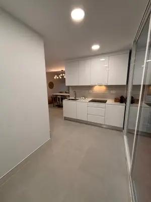 Una cocina o zona de cocina en Apartamento Olimpic Beach