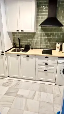 Una cocina o zona de cocina en Espectaculares vistas al Mediterráneo con piscina a 80 metros de la playa