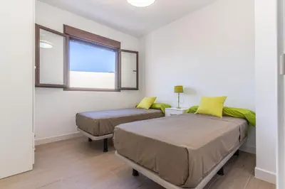 Cama o camas de una habitación en Refugio del Mar 11 - San José