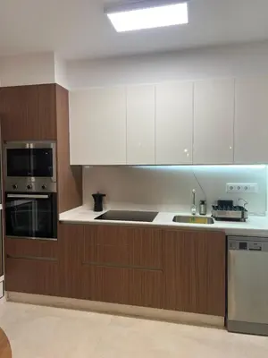Una cocina o zona de cocina en Piso con AC, piscina y pista de pádel y tenis en Águilas