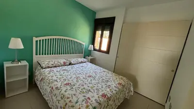 Cama o camas de una habitación en Precioso piso a 10 min de la playa