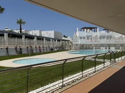 Piscina en o cerca de Apartamento con piscina frente al mar en Mojácar playa para familias y parejas de más de 30 años