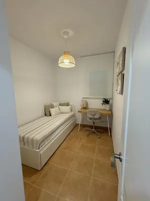 Cama o camas de una habitación en Apartamento con piscina frente al mar en Mojácar playa para familias y parejas de más de 30 años