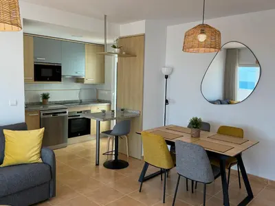 Una cocina o zona de cocina en Apartamento con piscina frente al mar en Mojácar playa para familias y parejas de más de 30 años