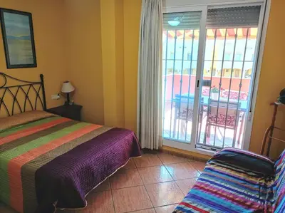 Cama o camas de una habitación en Piso naturista en Parque Vera 3