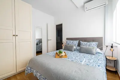 Cama o camas de una habitación en Apartamento Céntrico a 12 minutos de la playa