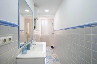 Un baño de Apartamento Céntrico a 12 minutos de la playa