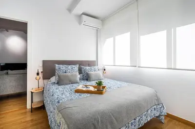 Cama o camas de una habitación en Apartamento Céntrico a 12 minutos de la playa