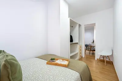 Una televisión o centro de entretenimiento en Apartamento Céntrico a 12 minutos de la playa