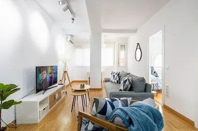 Una televisión o centro de entretenimiento en Apartamento Céntrico a 12 minutos de la playa