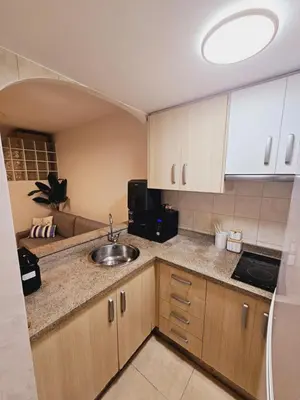 Una cocina o zona de cocina en Apartamento Buganvilla Beach