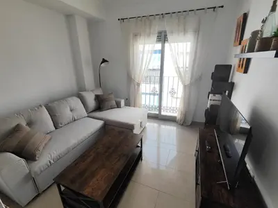 Una televisión o centro de entretenimiento en Ely Home
