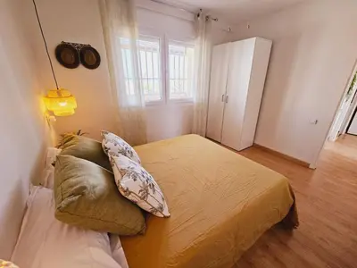 Cama o camas de una habitación en Apartamento Tropicana Beach