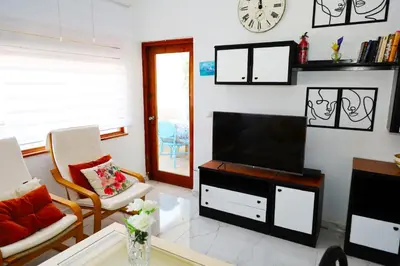 Una televisión o centro de entretenimiento en MojacarProperty, Apto Luis 1ª Línea de Playa