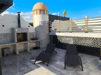 Un balcón o terraza de Ático Bora Palm,Piscina Privada Climatizable, 250m playa