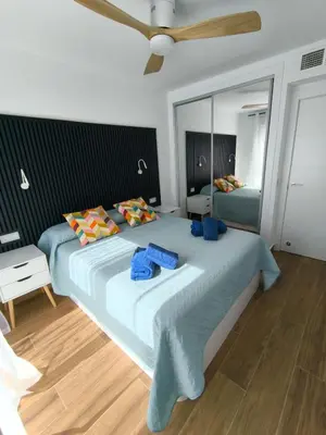Cama o camas de una habitación en Ático Bora Palm,Piscina Privada Climatizable, 250m playa