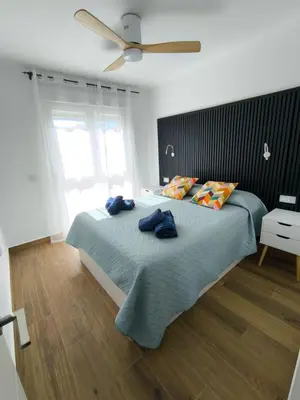 Cama o camas de una habitación en Ático Bora Palm,Piscina Privada Climatizable, 250m playa