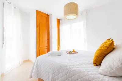Cama o camas de una habitación en Solarium privado en el centro de Águilas - By Aloha Palma