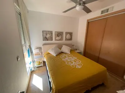 Cama o camas de una habitación en Apartamento con vistas al mar