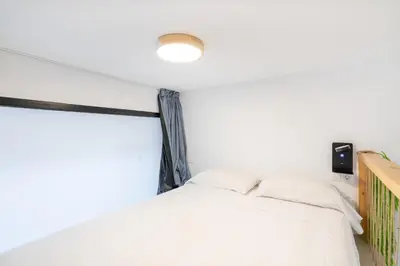 Cama o camas de una habitación en Tiendas 26