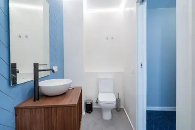 Un baño de Tiendas 26